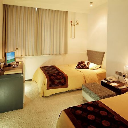 Dalian San Jiang Business Hotel Room photo